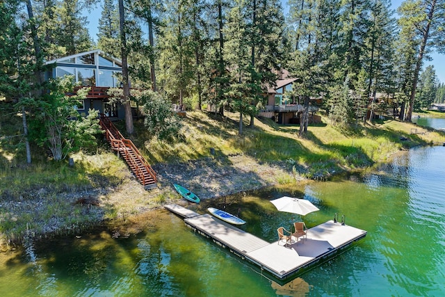 view of dock featuring a water view and stairway