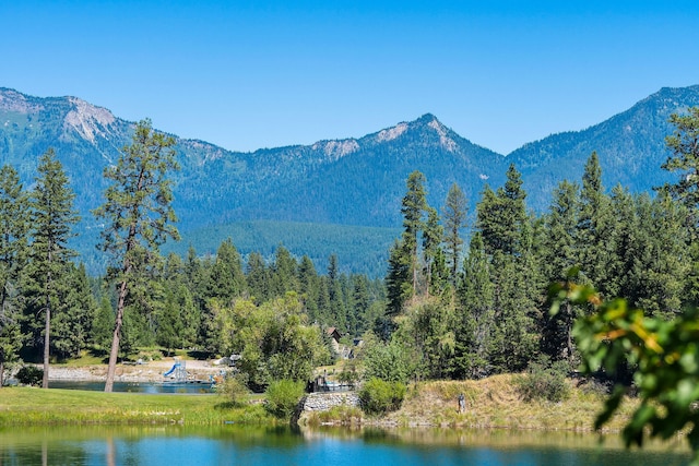 property view of mountains featuring a water view