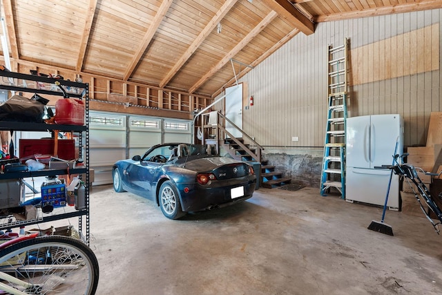 548 W Village Dr, Bigfork, MT 59911 - garage featuring freestanding refrigerator