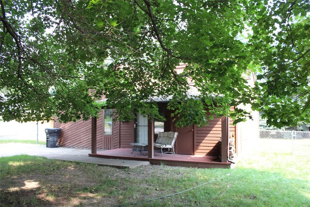 rear view of property featuring a patio area