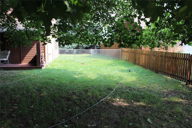 220 Fox Farm Dr, Whitefish, MT 59937 - fenced backyard featuring a wooden deck