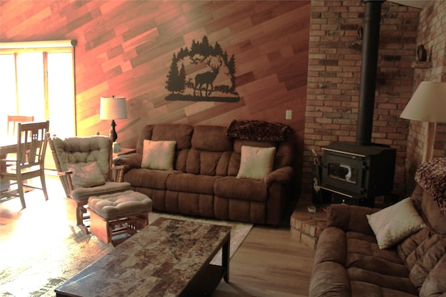 220 Fox Farm Dr, Whitefish, MT 59937 - living room with a wood stove and wood finished floors