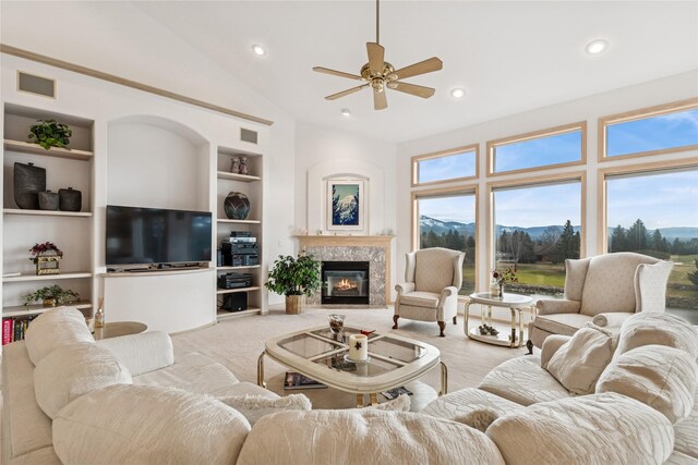 carpeted bedroom featuring multiple windows, access to exterior, and ceiling fan