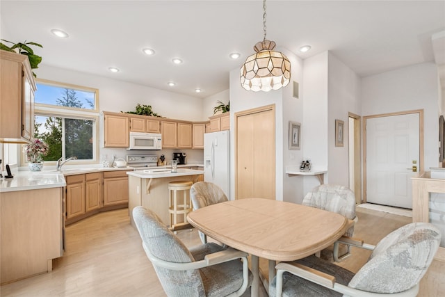 dining space featuring visible vents, recessed lighting, and light wood-style floors