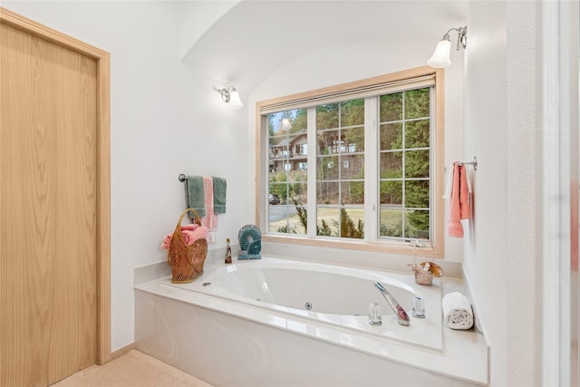 bathroom with a jetted tub