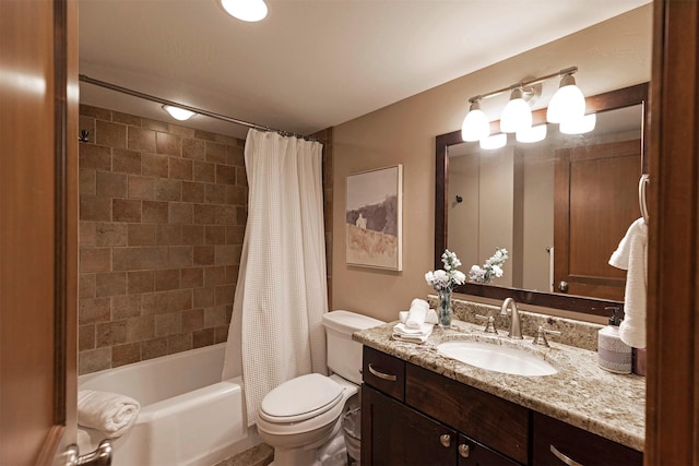 bathroom featuring shower / bathtub combination with curtain, toilet, and vanity