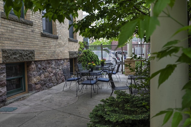 view of patio / terrace with fence