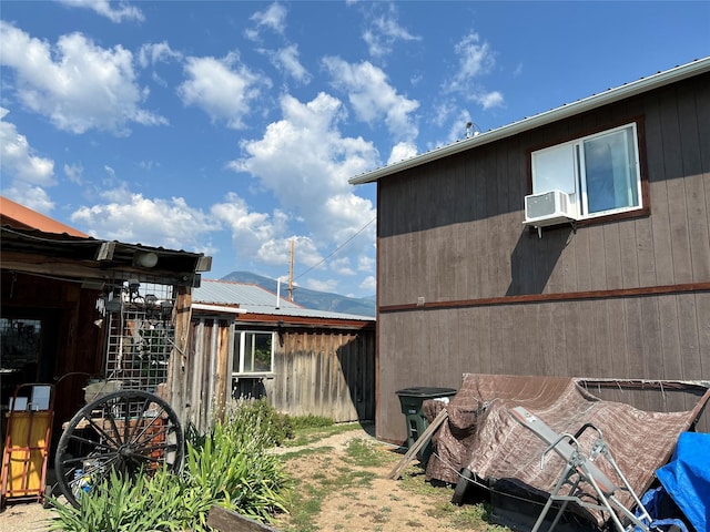 view of property exterior featuring cooling unit