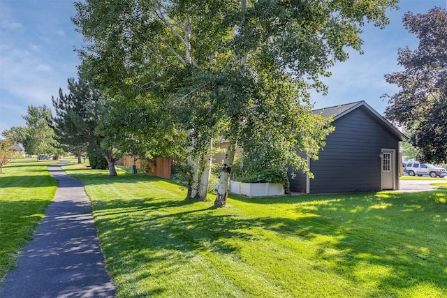 view of property exterior featuring a yard