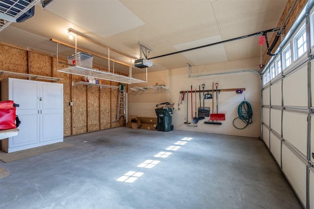 garage featuring a garage door opener