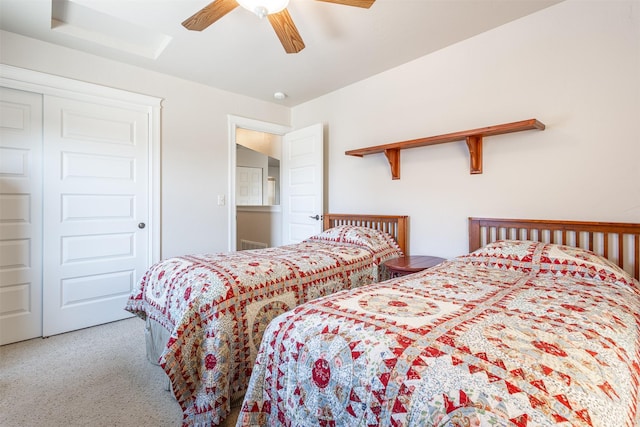 bedroom with a closet and a ceiling fan