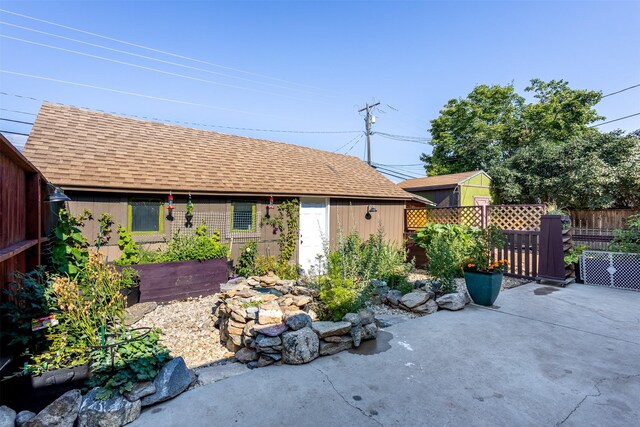 view of patio / terrace featuring a storage shed