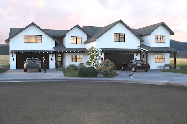 modern farmhouse featuring a garage