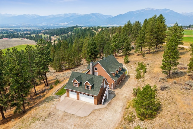 drone / aerial view featuring a mountain view