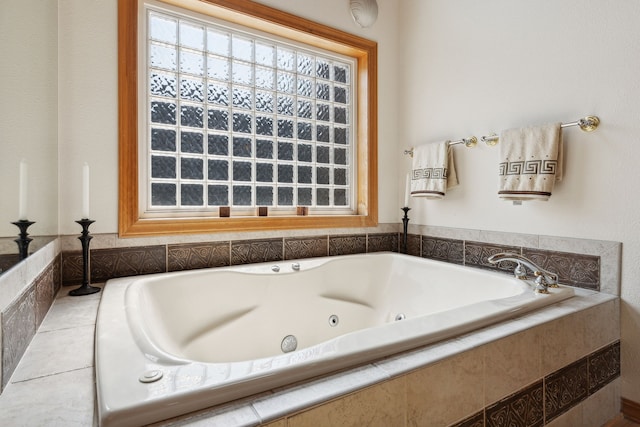 bathroom with tiled bath