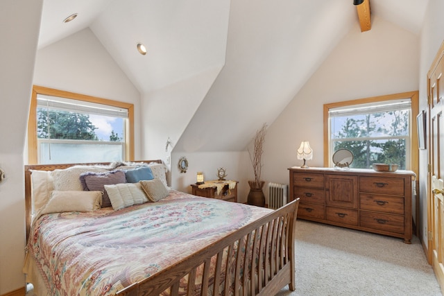 bedroom featuring vaulted ceiling with beams, radiator heating unit, light colored carpet, and multiple windows