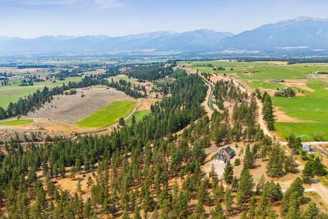 drone / aerial view featuring a rural view and a mountain view