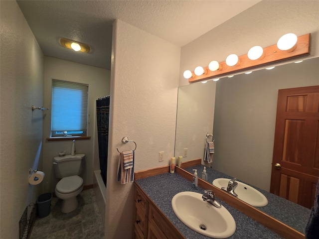 full bathroom with toilet, shower / tub combo with curtain, a textured ceiling, and vanity