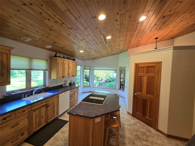 kitchen featuring a kitchen breakfast bar, sink, a center island, white dishwasher, and wooden ceiling