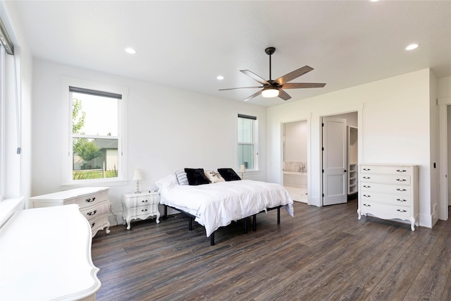 bedroom with dark wood finished floors, ensuite bath, recessed lighting, and ceiling fan