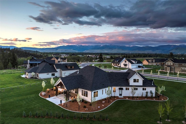 bird's eye view with a residential view and a mountain view