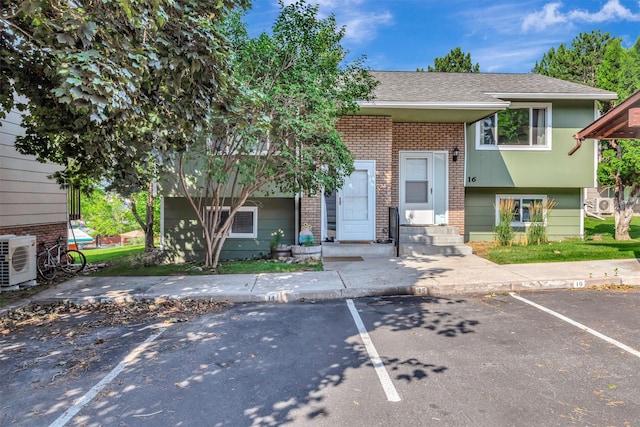 bi-level home featuring central AC