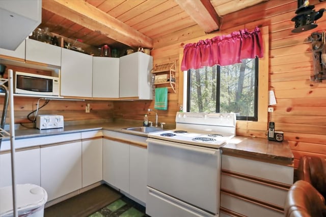 kitchen featuring white appliances, wooden ceiling, white cabinetry, beamed ceiling, and sink