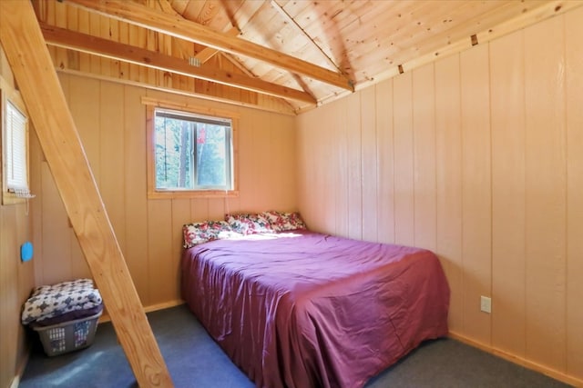 carpeted bedroom featuring vaulted ceiling, wood walls, and wood ceiling