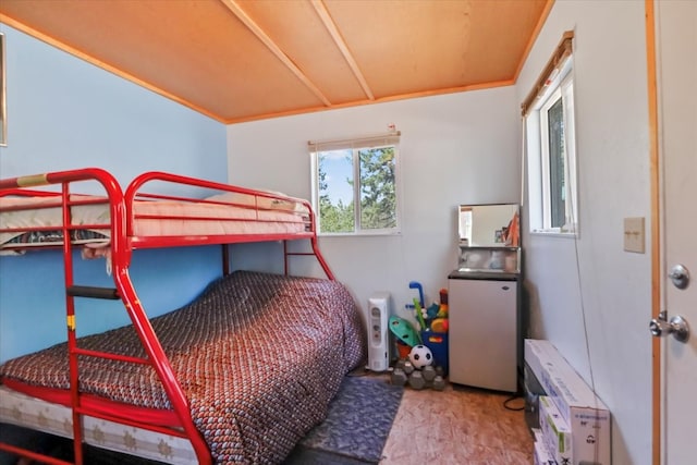 bedroom featuring crown molding