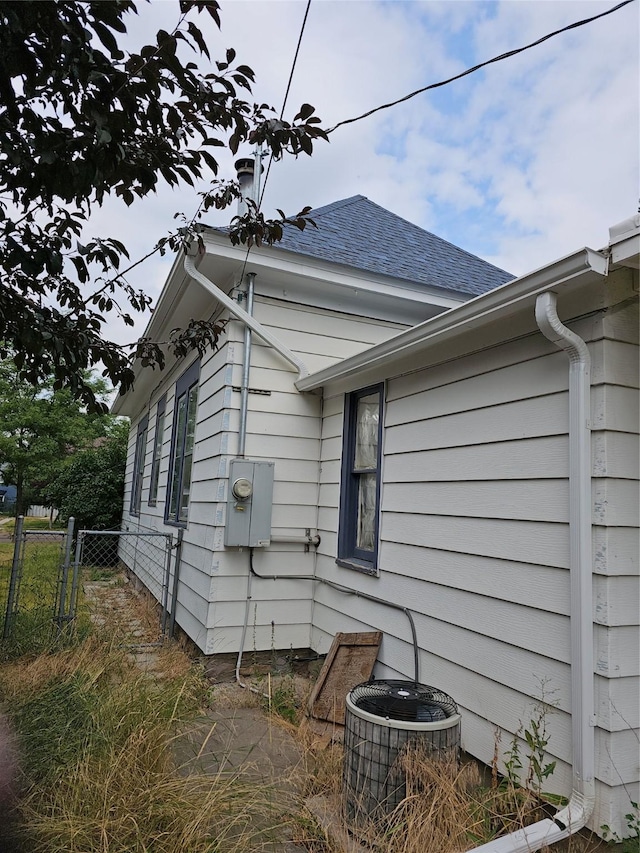 view of property exterior with central AC unit