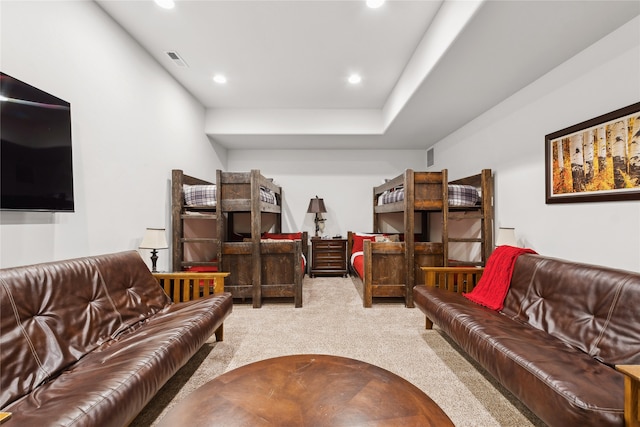 living room featuring light colored carpet