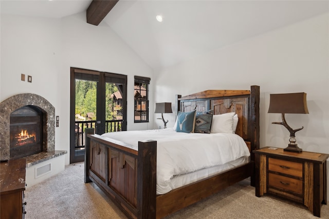 bedroom featuring access to exterior, high vaulted ceiling, light carpet, and beam ceiling