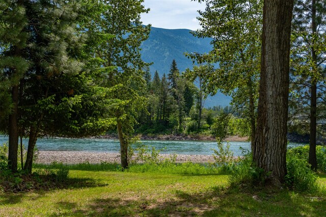 659 US Highway 2 E, Columbia Falls, MT 59912 - view of water feature featuring a mountain view and a view of trees