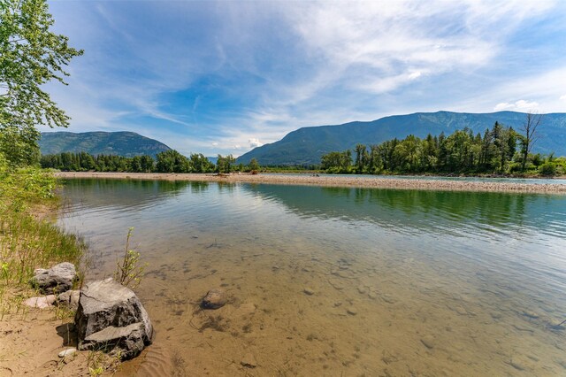 659 US Highway 2 E, Columbia Falls, MT 59912 - property view of water featuring a mountain view