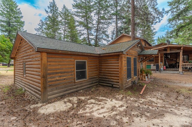 659 US Highway 2 E, Columbia Falls, MT 59912 - view of home's exterior with roof with shingles