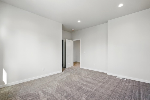 940 Kemp St Unit A, Missoula, MT 59801 - empty room with light colored carpet and recessed lighting