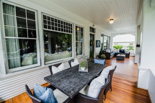 wooden deck with an outdoor hangout area