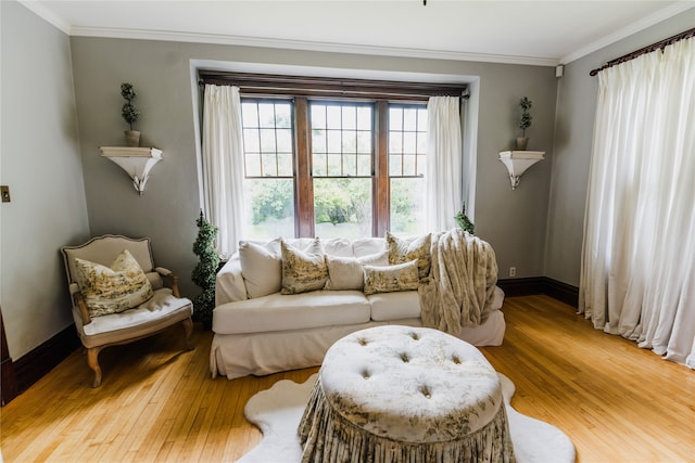 living room featuring ornamental molding and hardwood / wood-style flooring