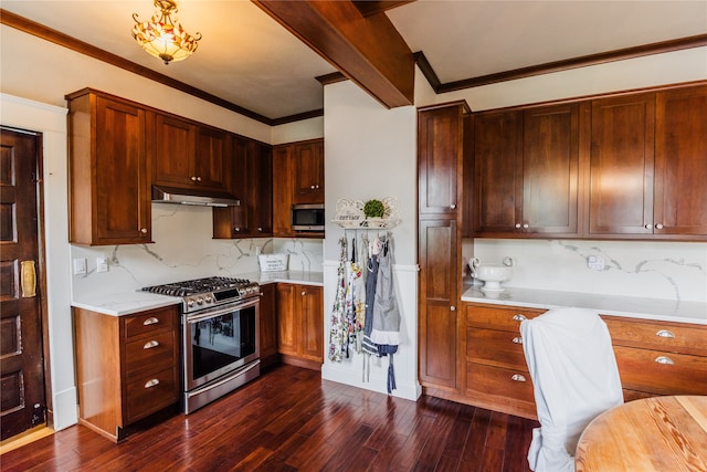 kitchen with appliances with stainless steel finishes, backsplash, crown molding, and dark wood-type flooring