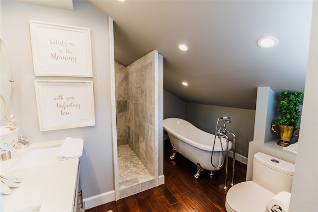 full bathroom featuring wood-type flooring, vanity, shower with separate bathtub, and toilet