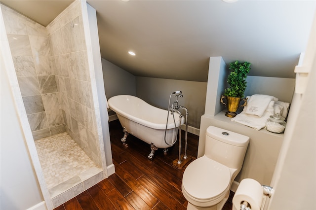 bathroom with lofted ceiling, independent shower and bath, toilet, and hardwood / wood-style floors