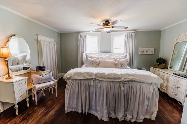 bedroom with ornamental molding, dark hardwood / wood-style floors, and ceiling fan