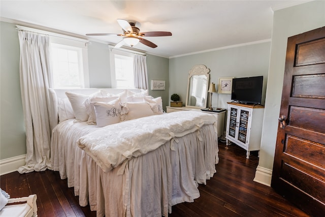 bedroom with crown molding, dark wood-type flooring, and ceiling fan