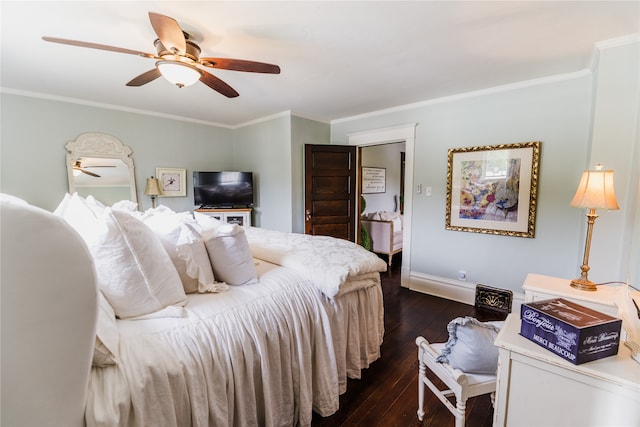 bedroom featuring ceiling fan, dark hardwood / wood-style floors, and ornamental molding