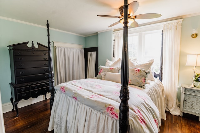 bedroom with ceiling fan, ornamental molding, and dark hardwood / wood-style flooring