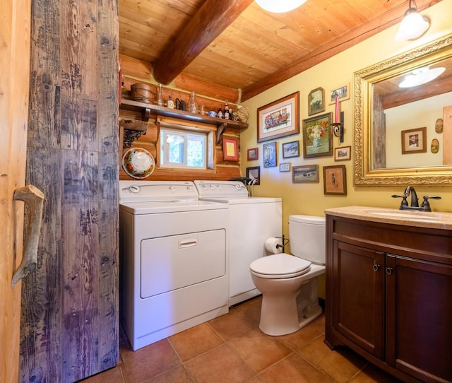 5899 Black Lake Rd, Rexford, MT 59930 - bathroom with vanity, toilet, wood ceiling, beam ceiling, and washer and dryer