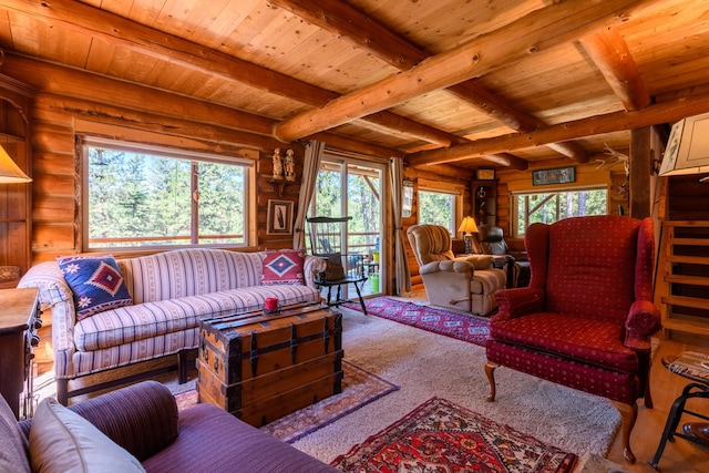 living room with rustic walls, beamed ceiling, and wooden ceiling