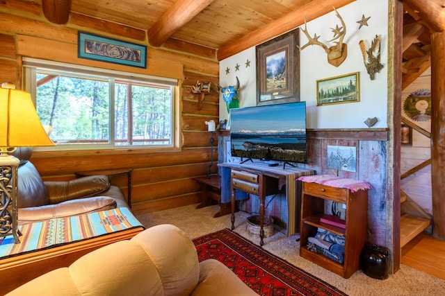 living room featuring beamed ceiling, rustic walls, wooden ceiling, and hardwood / wood-style flooring