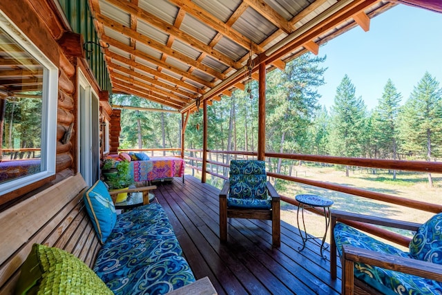 5899 Black Lake Rd, Rexford, MT 59930 - wooden terrace with a wooded view