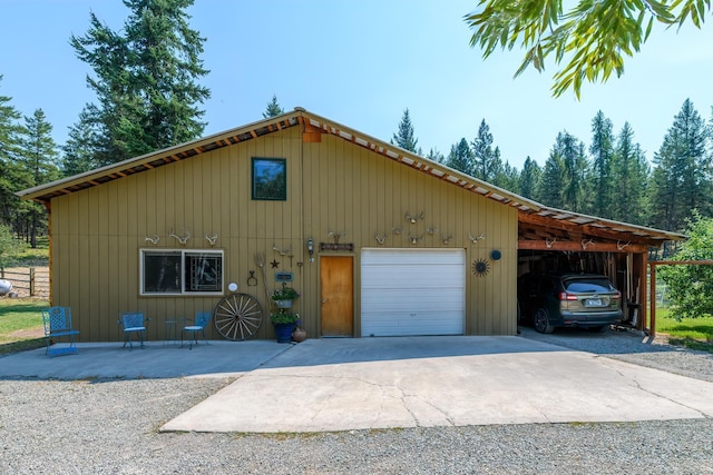 5899 Black Lake Rd, Rexford, MT 59930 - chalet / cabin with driveway and a detached garage